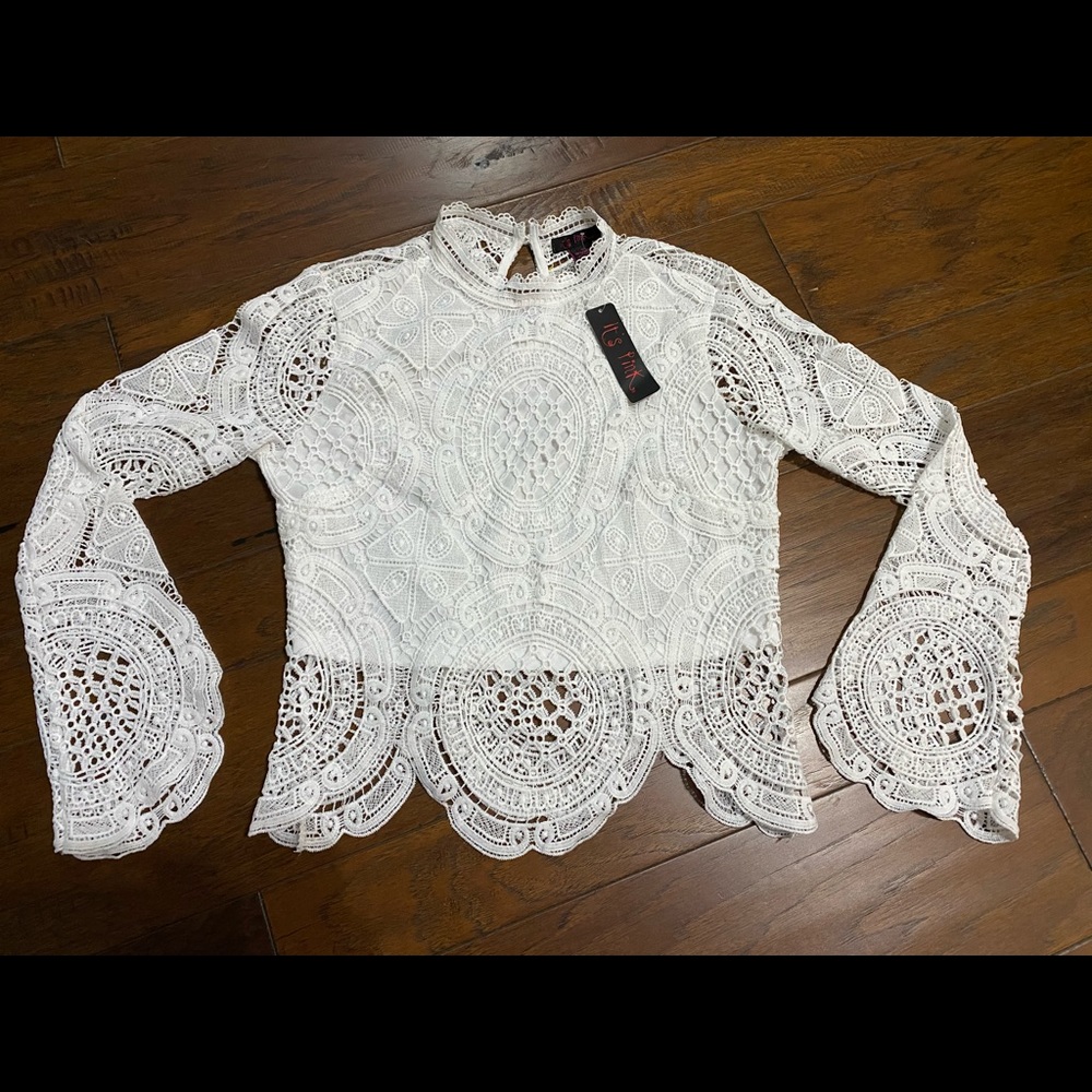 Laced white top with white under shirt